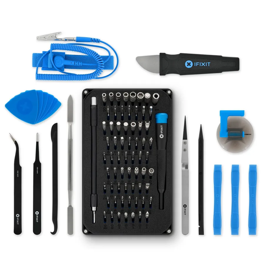 A set of tools used for electronics assembly, including soldering iron, tweezers, and multimeter.