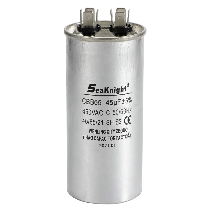 An AC capacitor, often cylindrical with terminals.