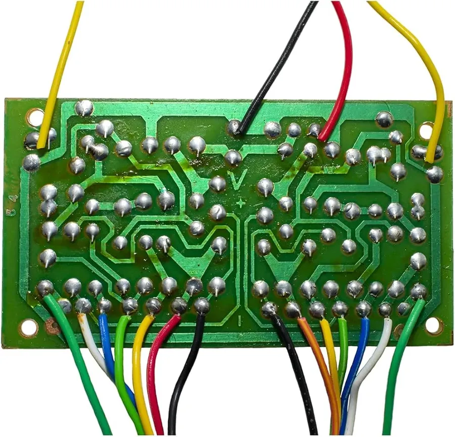 A circuit board with BC548 transistors soldered onto it.