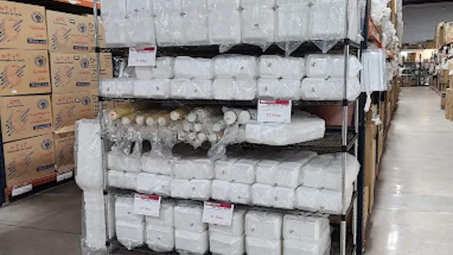 A view inside a warehouse of a local supplier with shelves of electronic components.