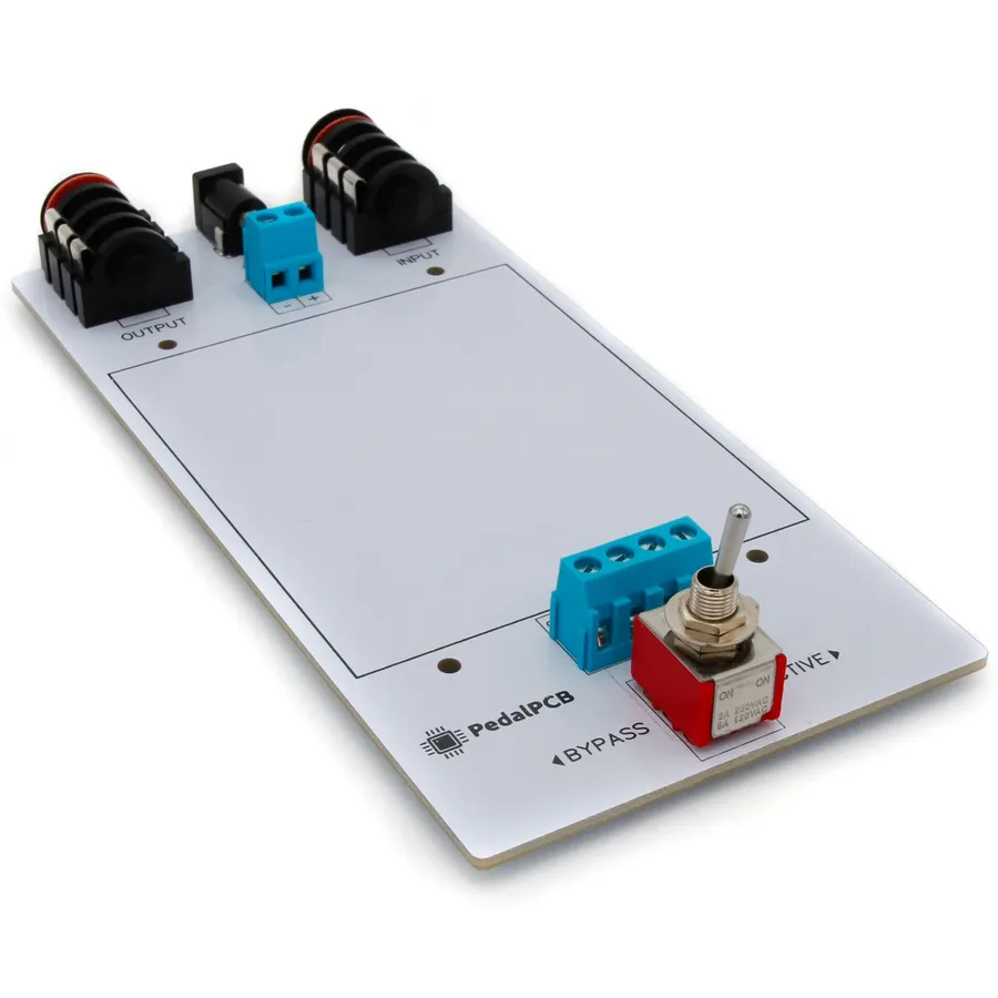 A collection of components for a pedal PCB.