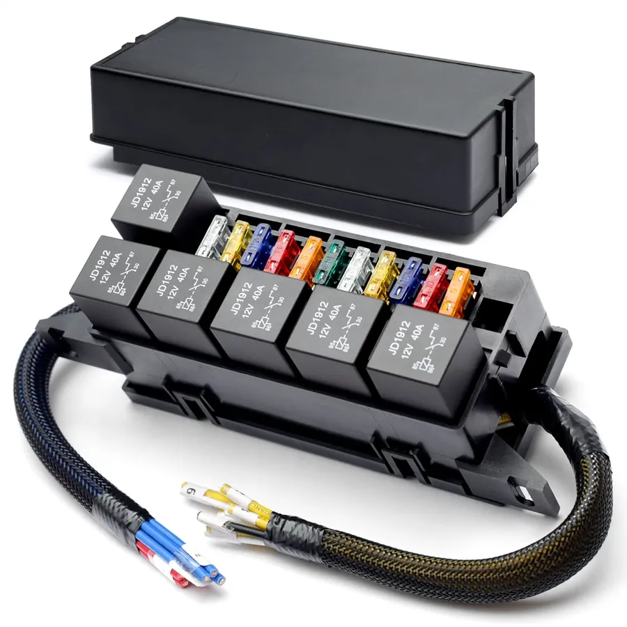 An image of a car fuse box with various fuses and relays.
