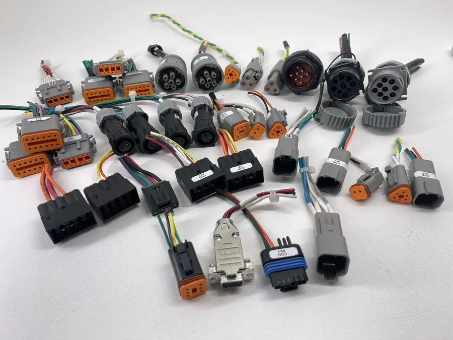 Various types of automotive wiring harness connectors.