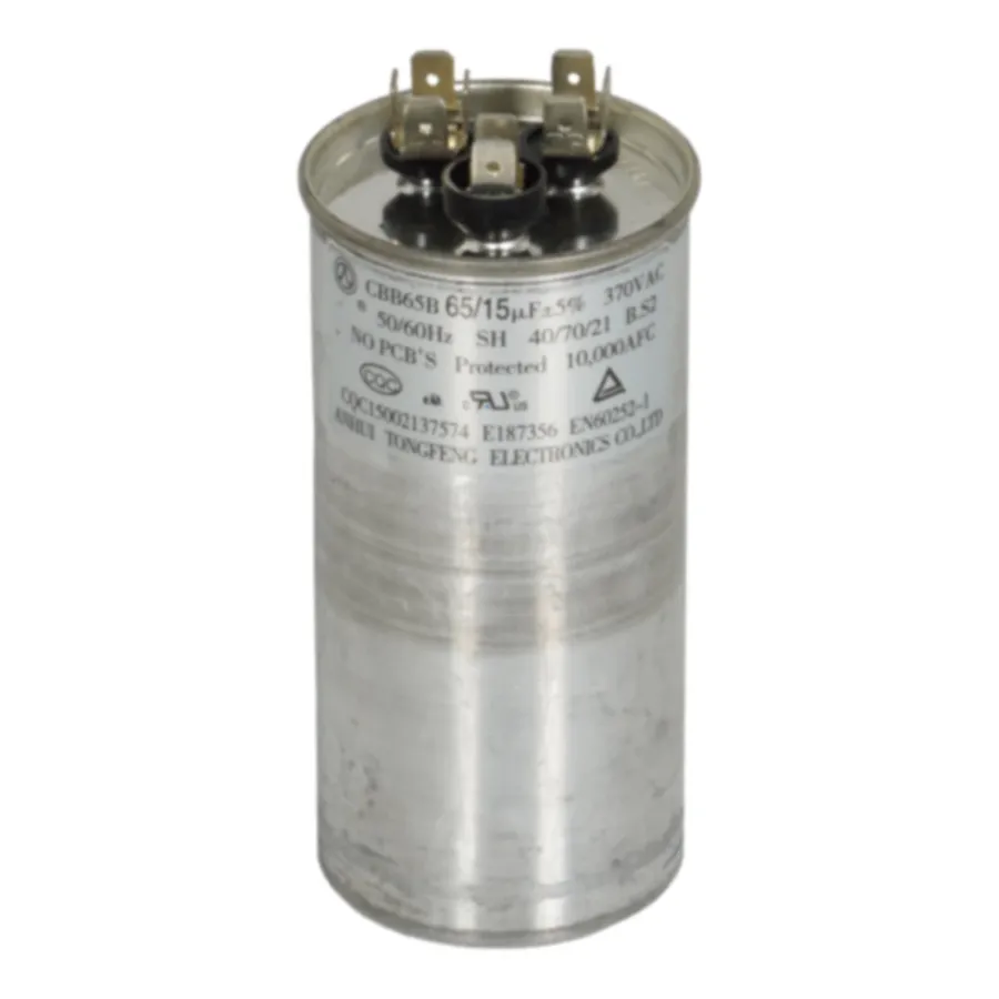 A close-up of a bulging or damaged run capacitor.
