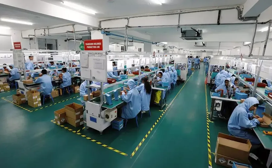 A production line showing the assembly of electronic components.