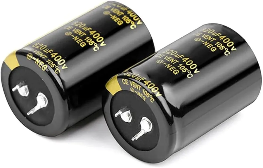 An audio device, highlighting the capacitors used in its circuit.