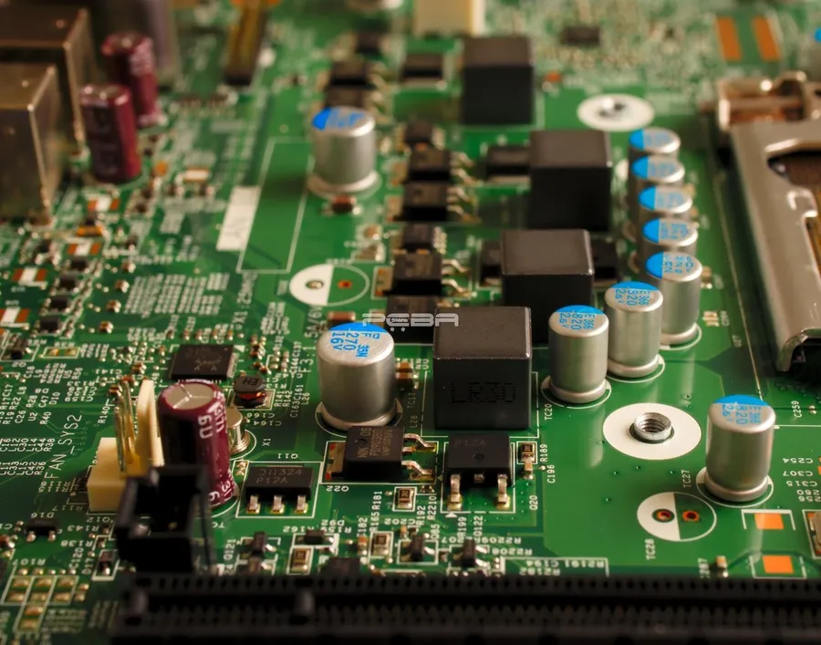 A circuit board with various components including resistors.