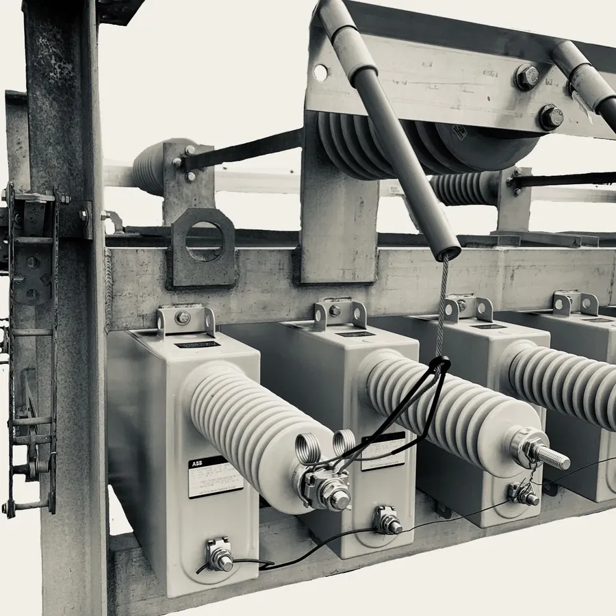 Close up of shunt capacitors within an electrical substation.