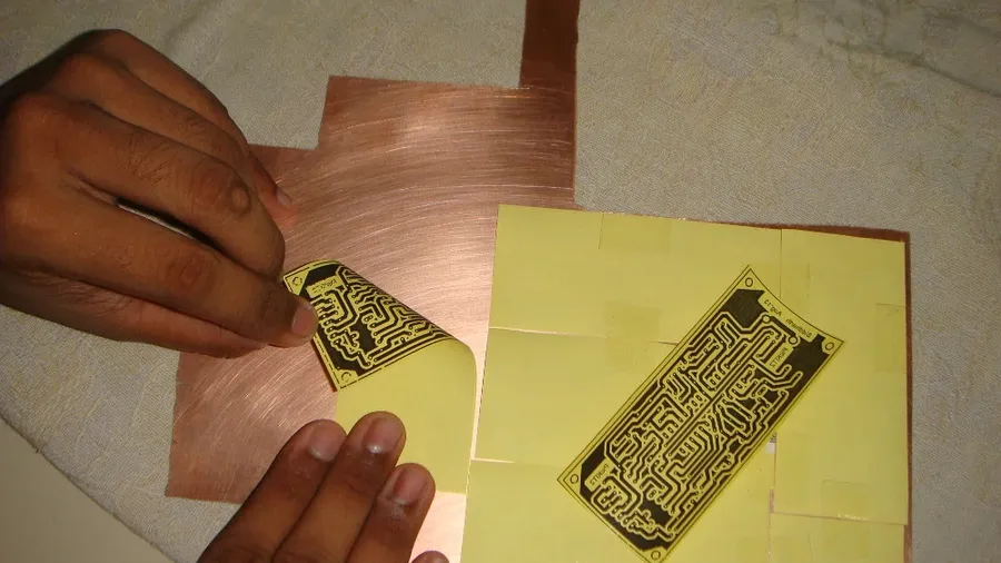 A PCB with a toner transfer pattern applied.