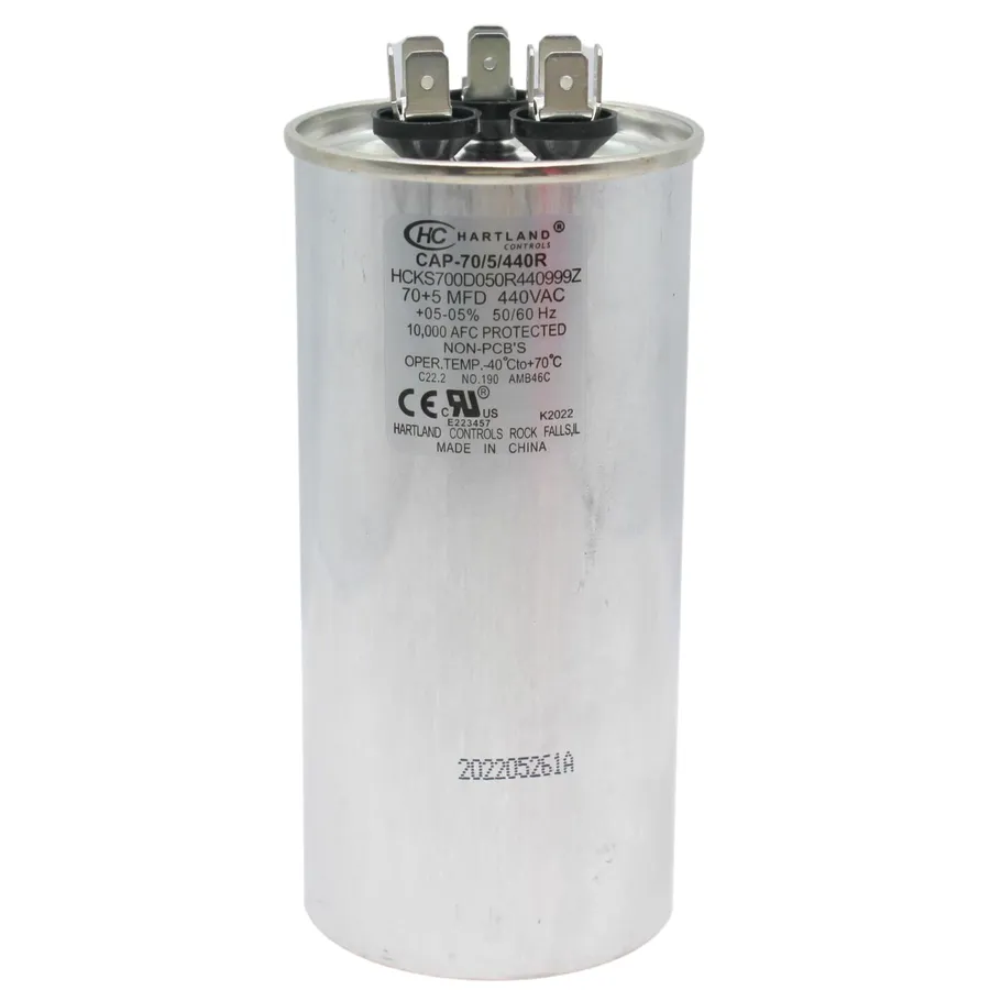 A Genteq capacitor installed in an HVAC system.