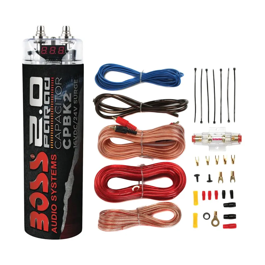 A car audio capacitor being installed, showing the wiring and connections.