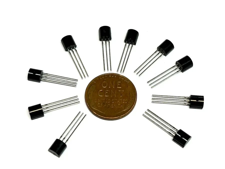 A large quantity of BC547 transistors packaged in bulk.