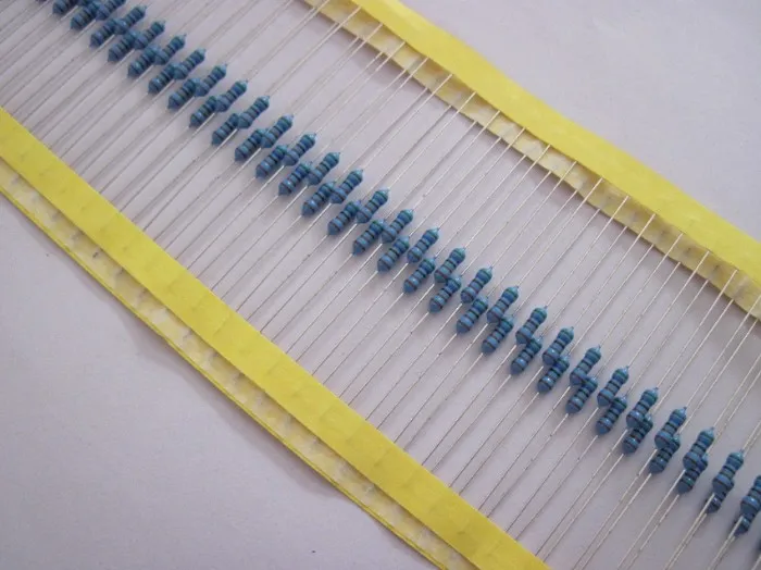 A reel of resistors with paper tape packaging.