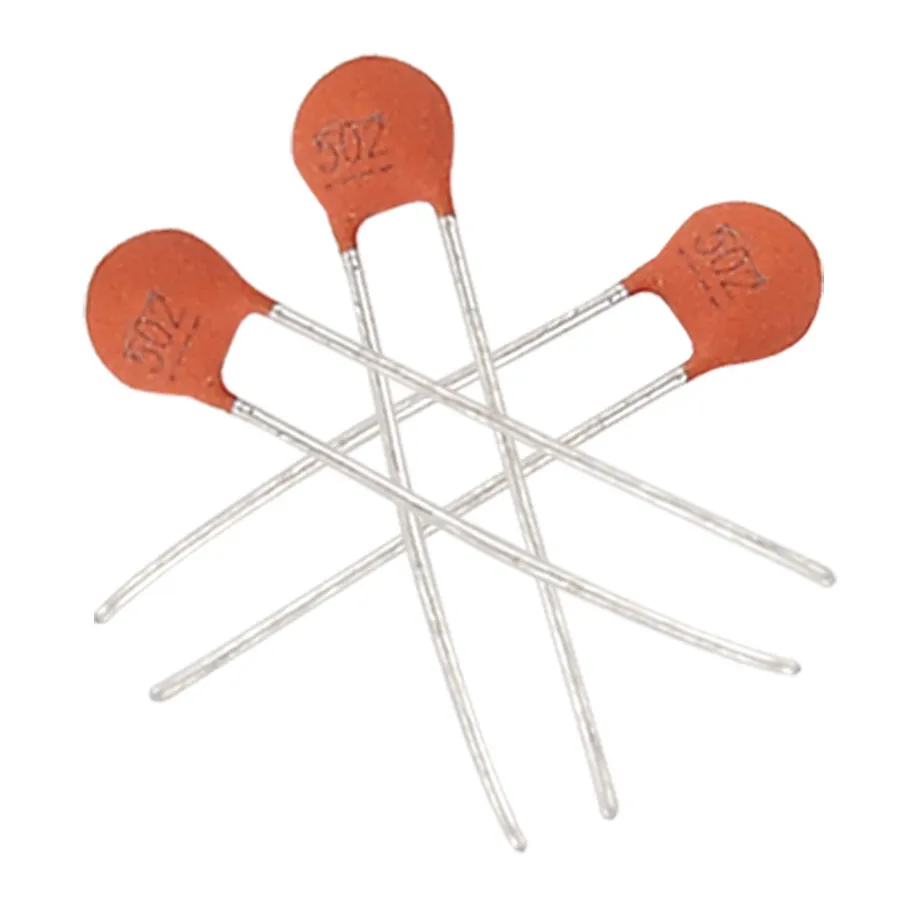 A side-by-side comparison of a mylar capacitor and a ceramic capacitor.