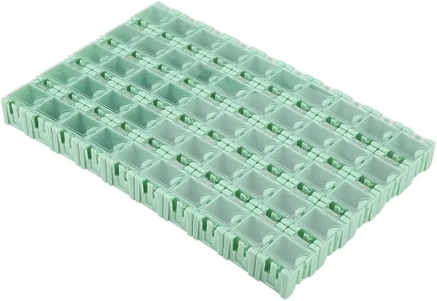 A box filled with various electronic components, including resistors.