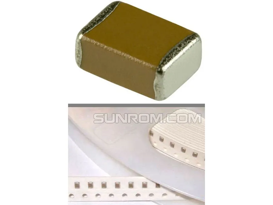 A surface mount capacitor marked '105'.