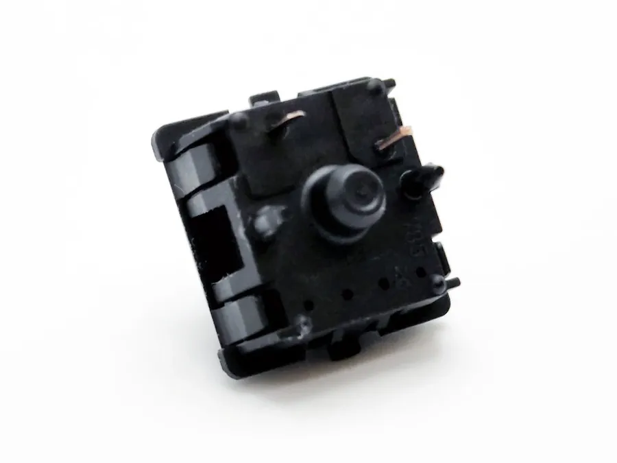 A comparison image of a PCB mount switch and a plate mount switch.