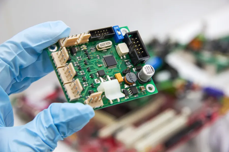 Close up of a PCB board showing circuit details.