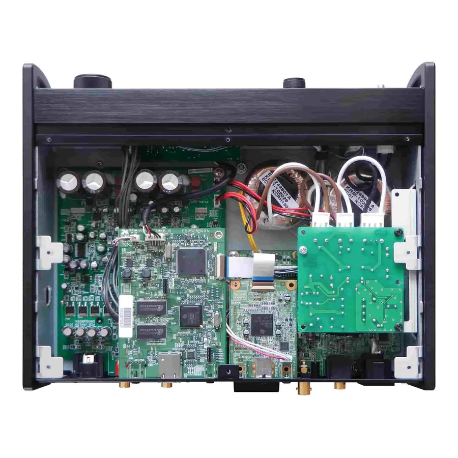 A detailed view of various components on a UPS PCB, such as capacitors, resistors, and ICs.