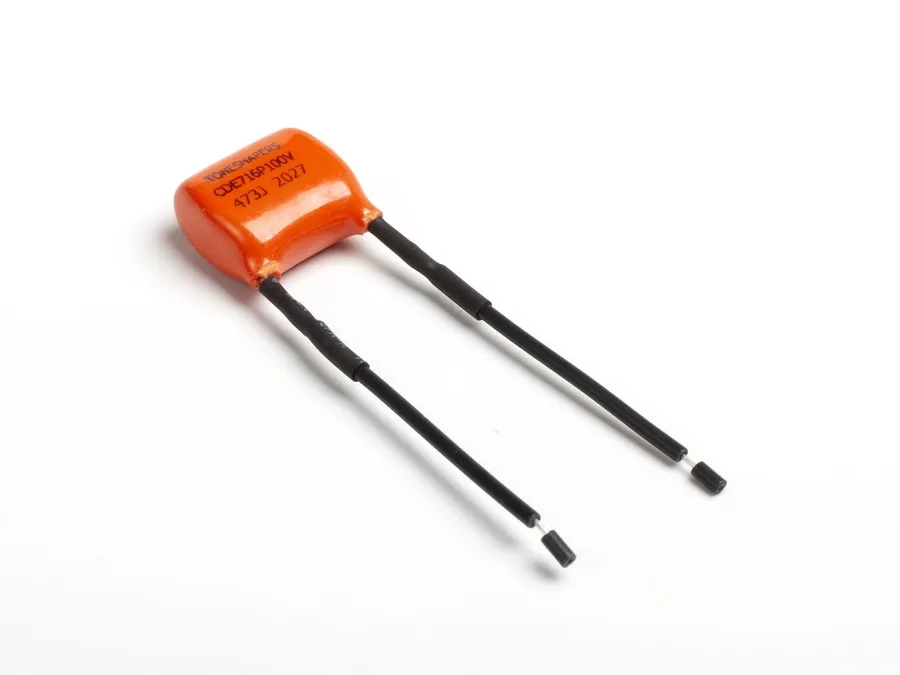 Close-up view of various capacitor leads.