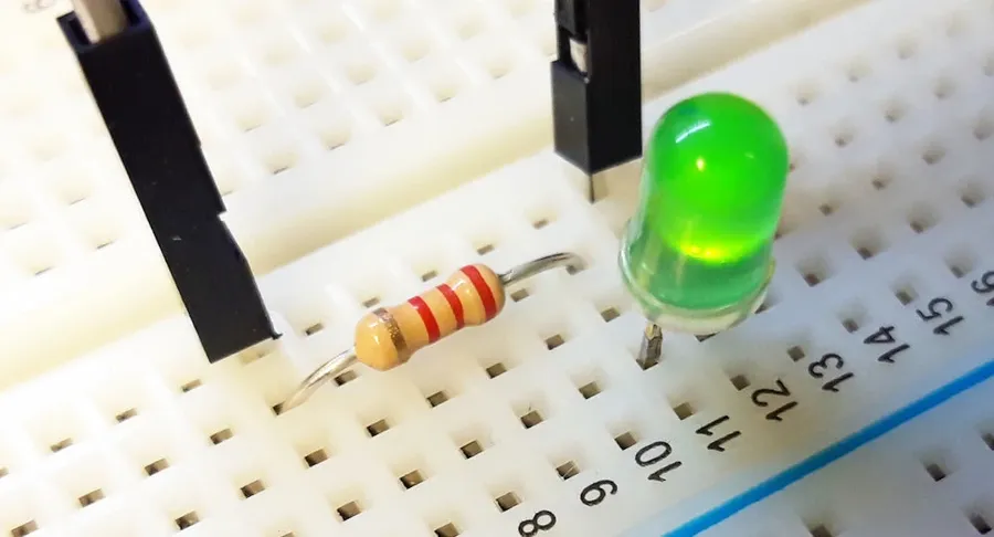 An LED connected with a 300 ohm resistor.
