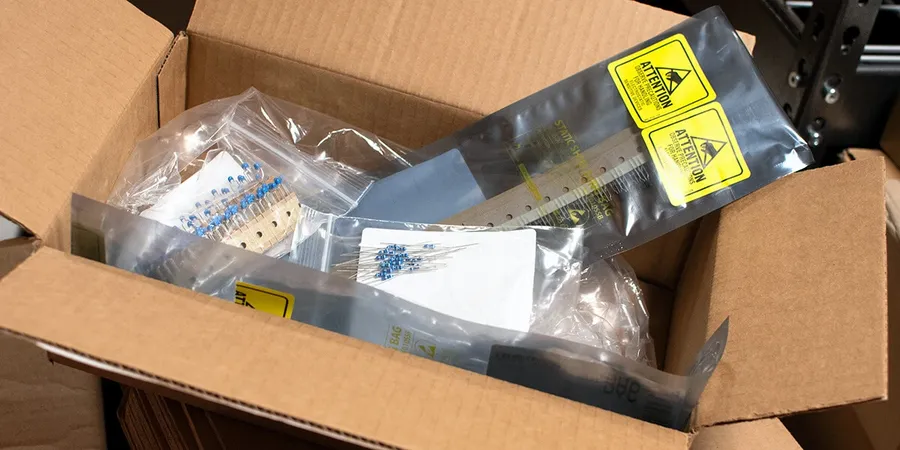 A package of electronic components being prepared for shipping.