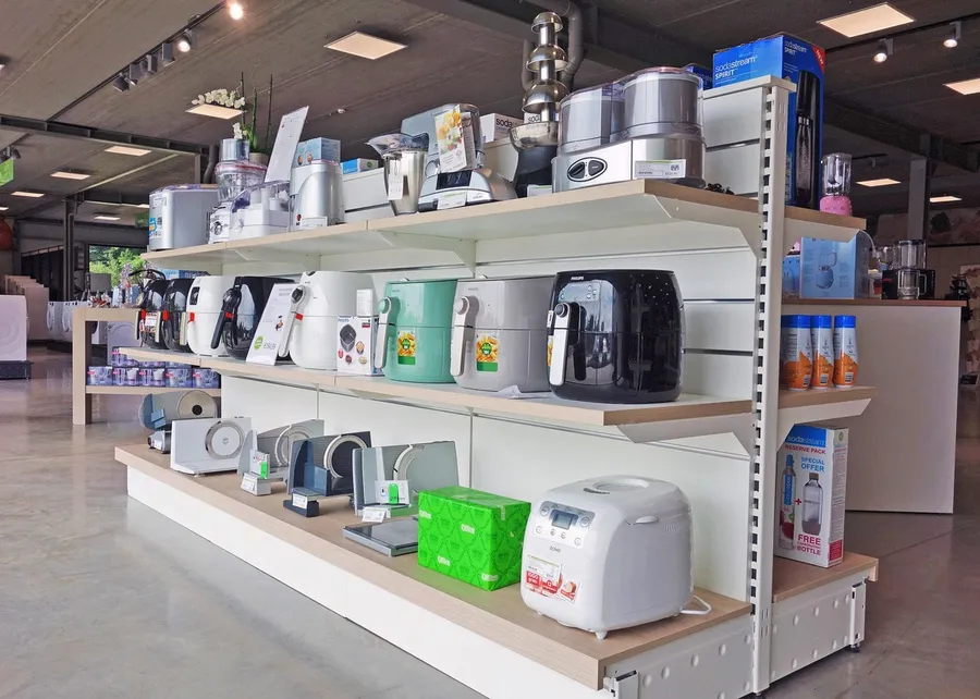 A well-stocked shelf in an electronic hobby store.