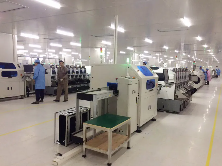 An automated surface mount technology assembly line in operation.