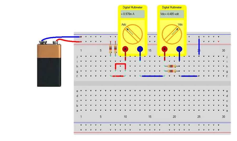 Resistors connected in series on a breadboard.