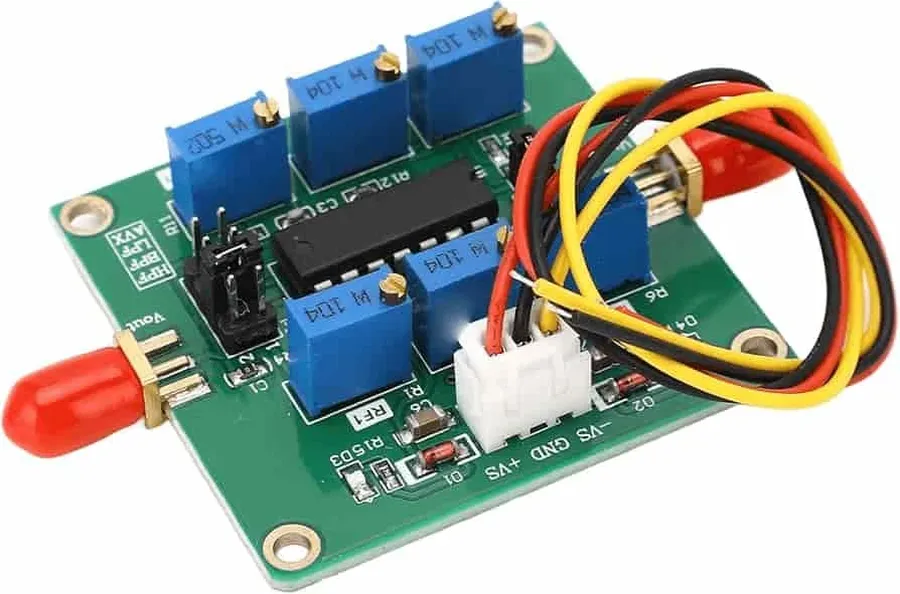 A printed circuit board with components forming an active filter.