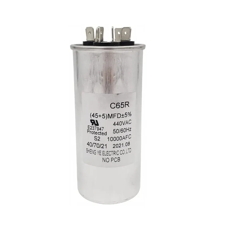 A C65R capacitor with visible technical specifications printed on its surface.