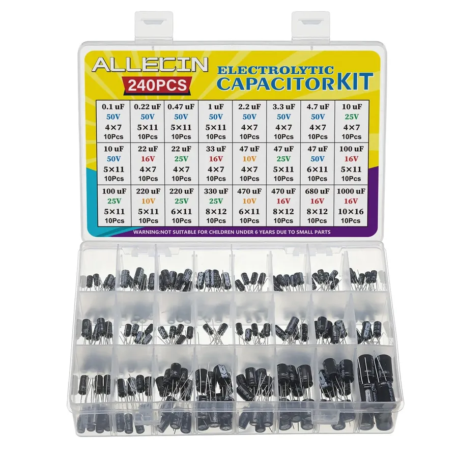 A capacitor kit containing various types and sizes of capacitors neatly organized.