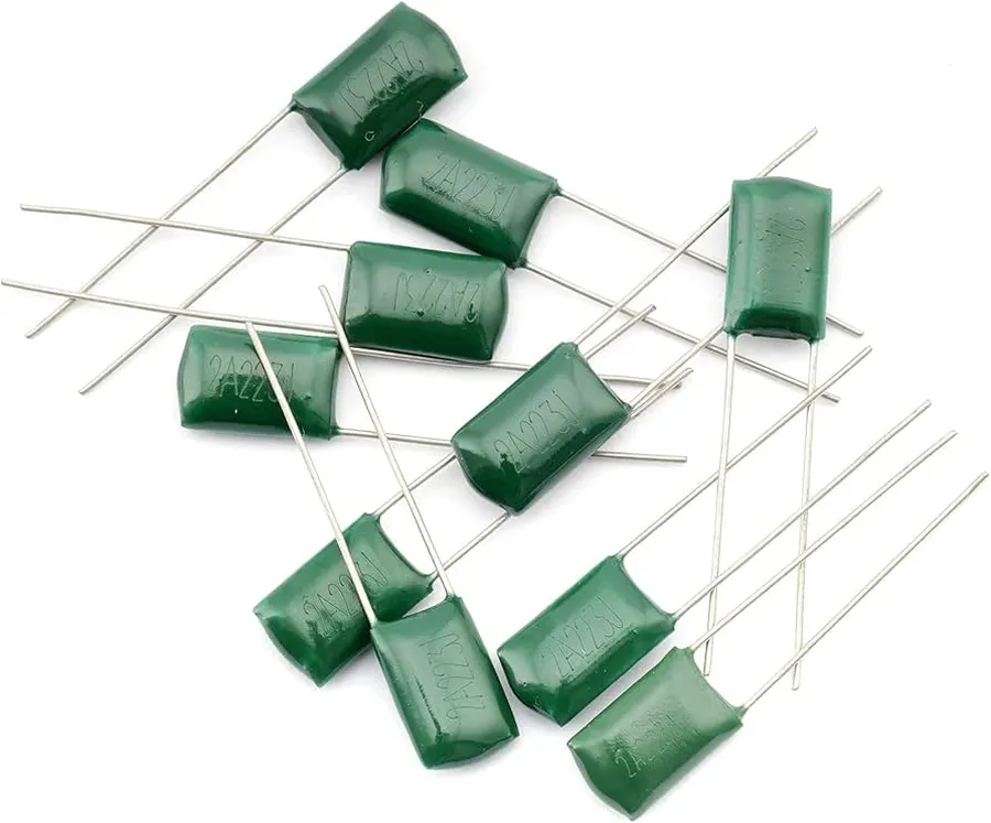 A selection of film capacitors, including polyester and polypropylene, for guitars.