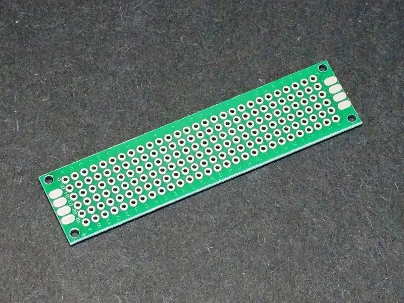 A close-up view of a bare PCB prototype.