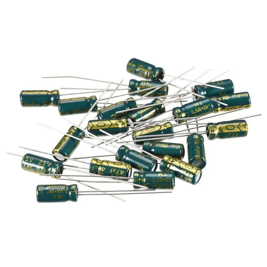 A 47uF capacitor soldered onto a circuit board.