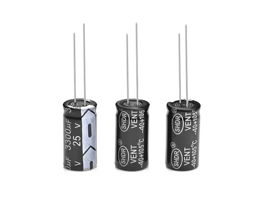 A side-by-side comparison of axial and radial capacitors.