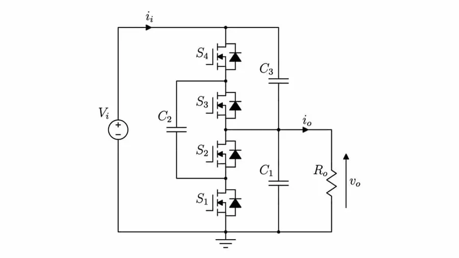 A close-up view of a switched capacitor voltage converter chip on a circuit board.