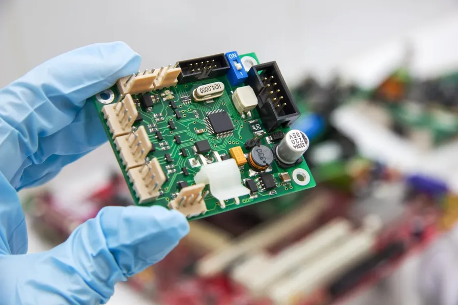 A close-up view of a printed circuit board with various electronic components.