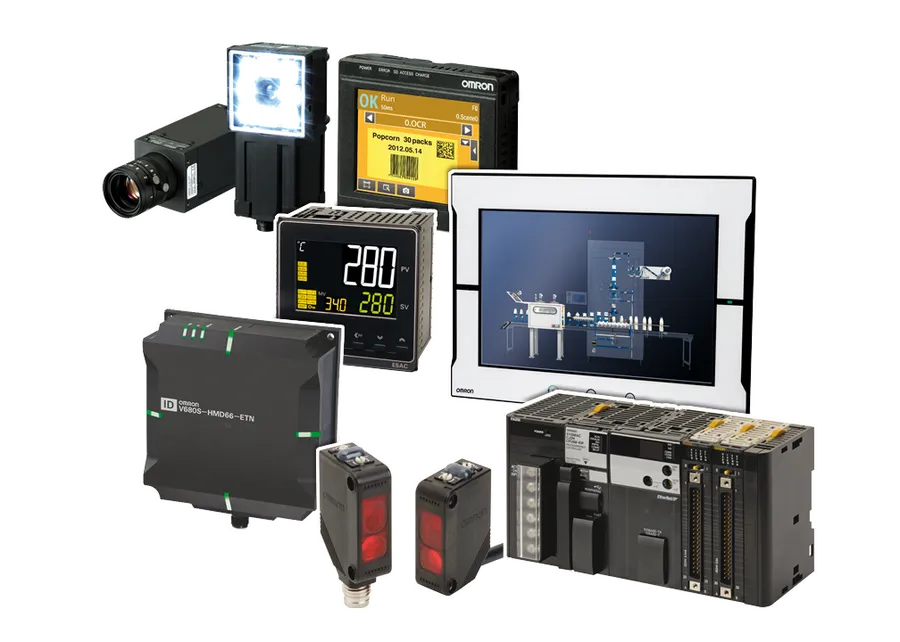 A variety of Omron automation products displayed on a table.