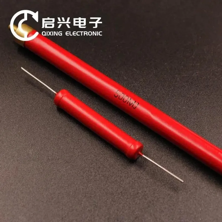 Close-up of a high-voltage resistor soldered onto a circuit board.