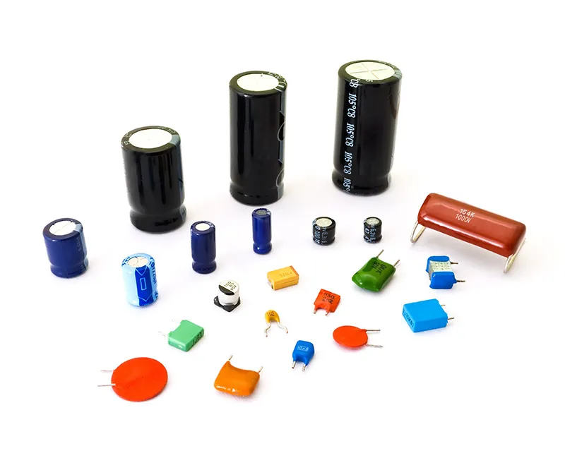 Various sizes of capacitors arranged on a table