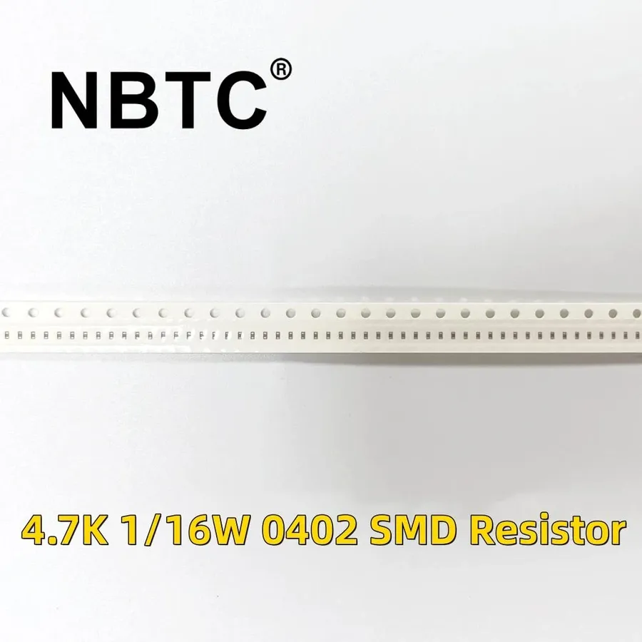 A close-up view of a single 0402 resistor.
