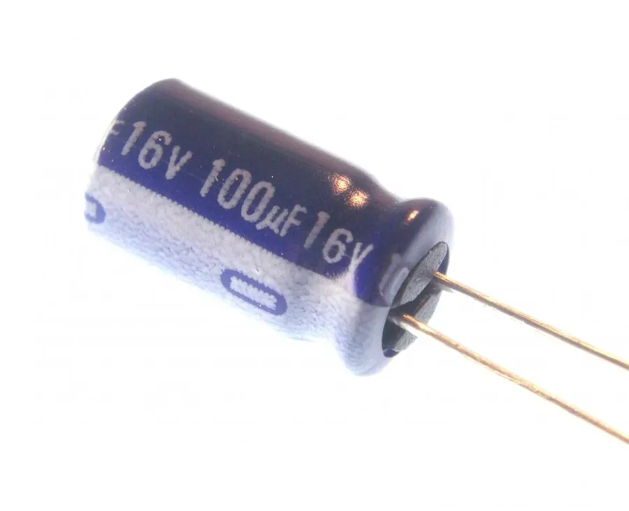 An electrolytic 100uF 16V capacitor with visible markings.