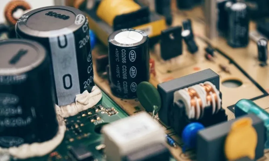 A capacitor mounted on a circuit board.