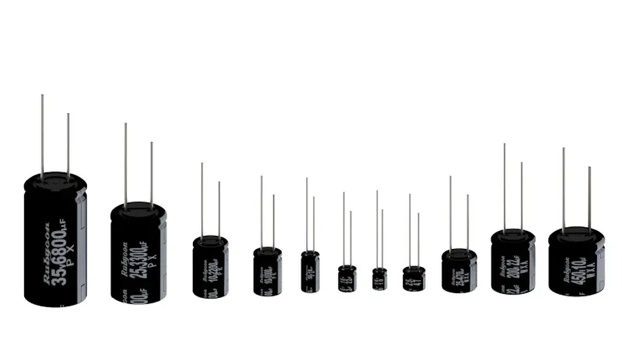 Several radial electrolytic capacitors with their cylindrical bodies.