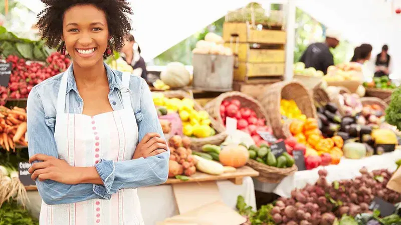 A customer purchasing fresh produce from a smart vending machine