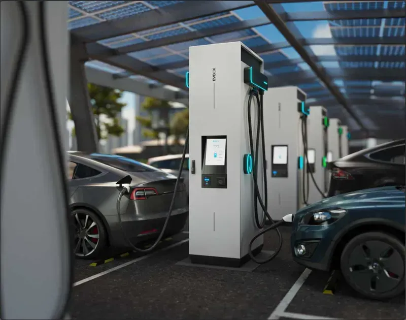 An electric vehicle charging at a shared charging pile