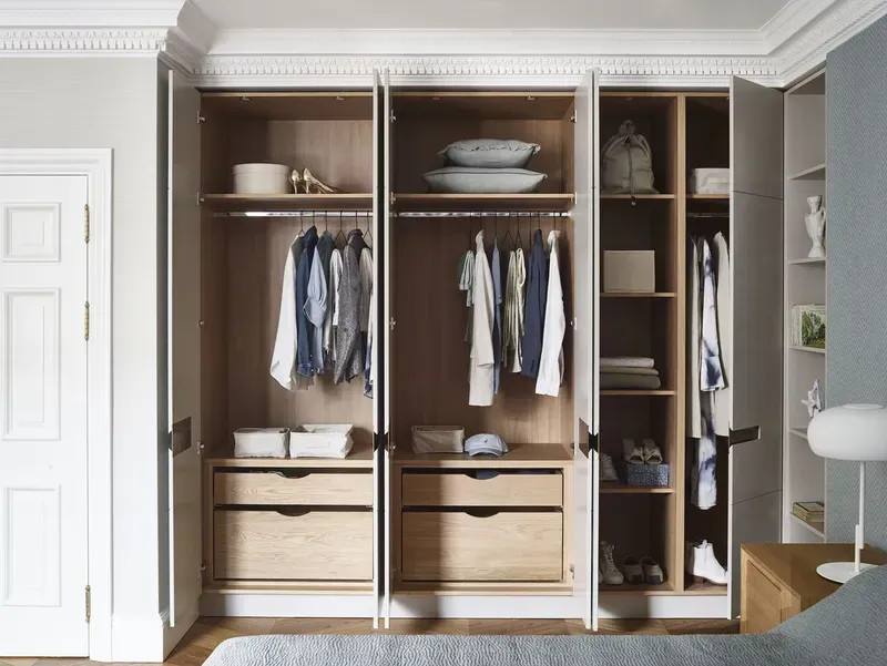 Interior view of a smart shared storage wardrobe with organizational features