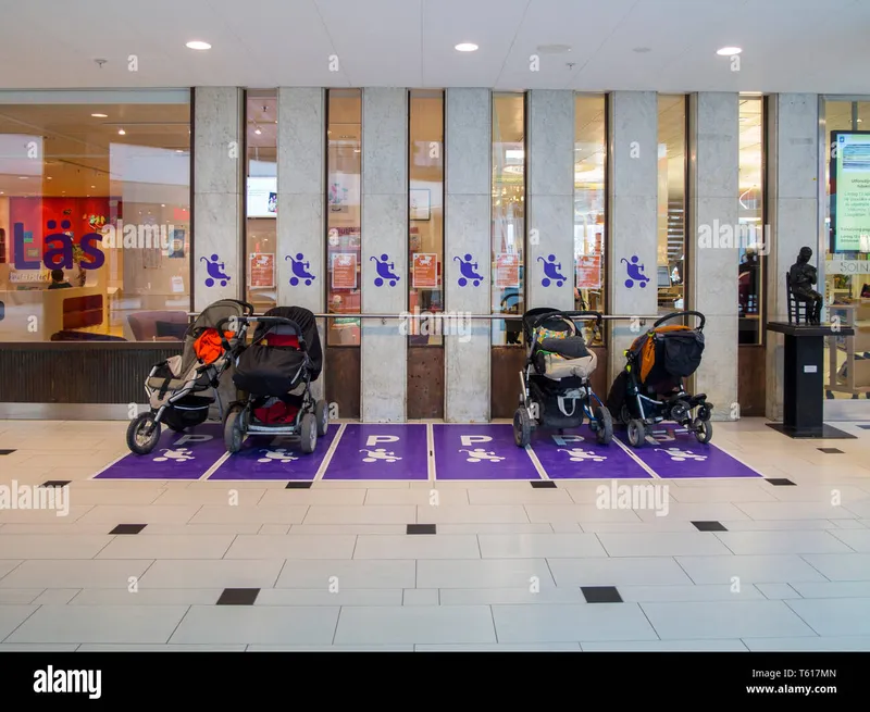 Shared strollers neatly parked at a station in a public area