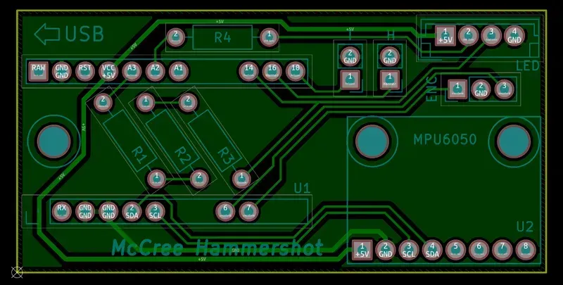 Close-up of the internal circuit board within a toy gun cabinet